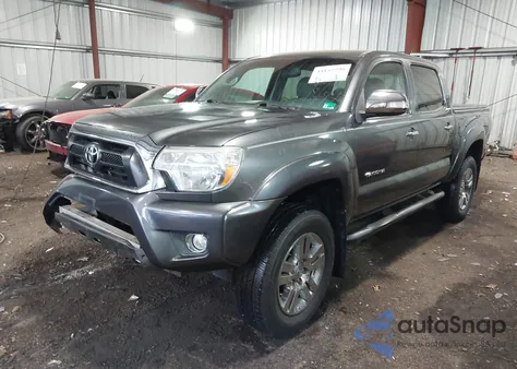2013 Toyota Tacoma Base V6 z USA, uszkodzony, nr VIN 3TMLU4EN1DM114606
